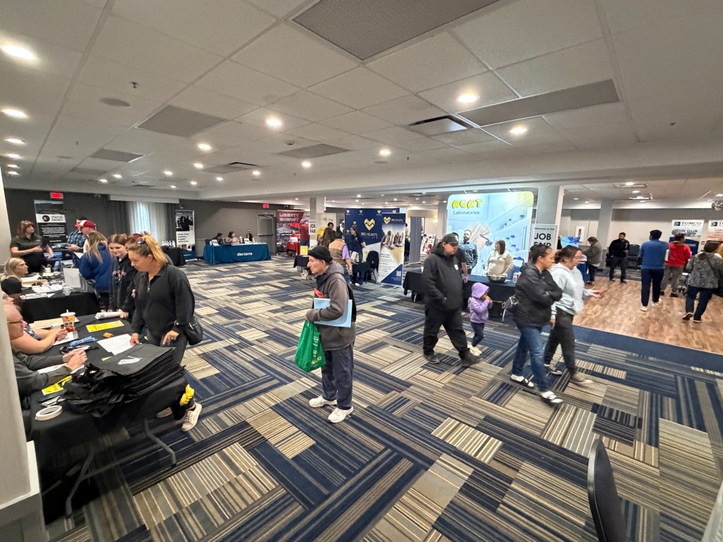 A busy exhibit floor at the Grande Prairie Job Fair