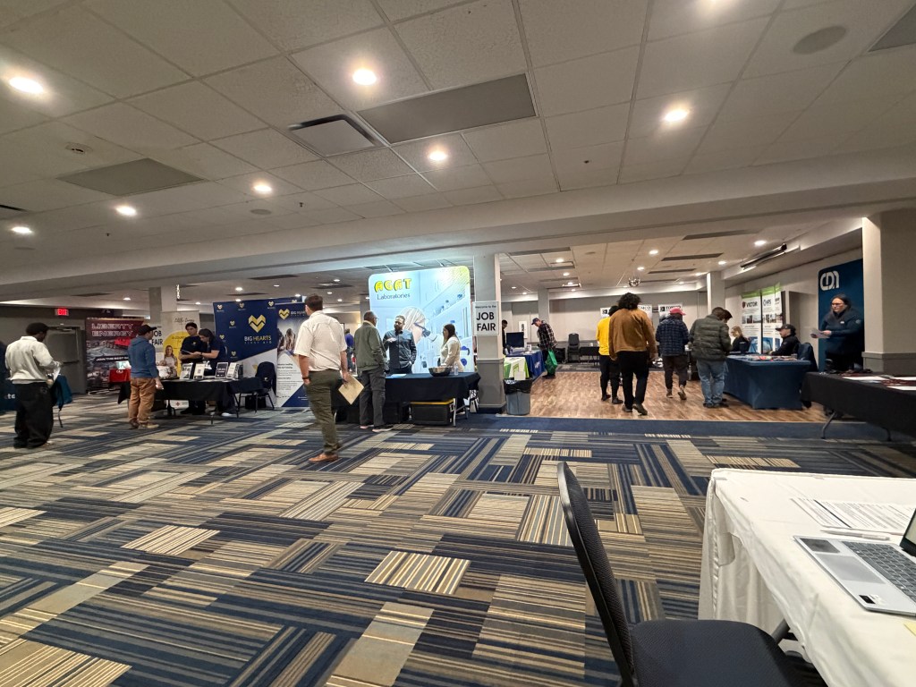 Rows of employer booths at the Grande Prairie Job Fair